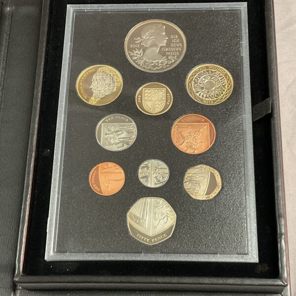 Open 2012 Royal Mint proof coin set showing coin designs.