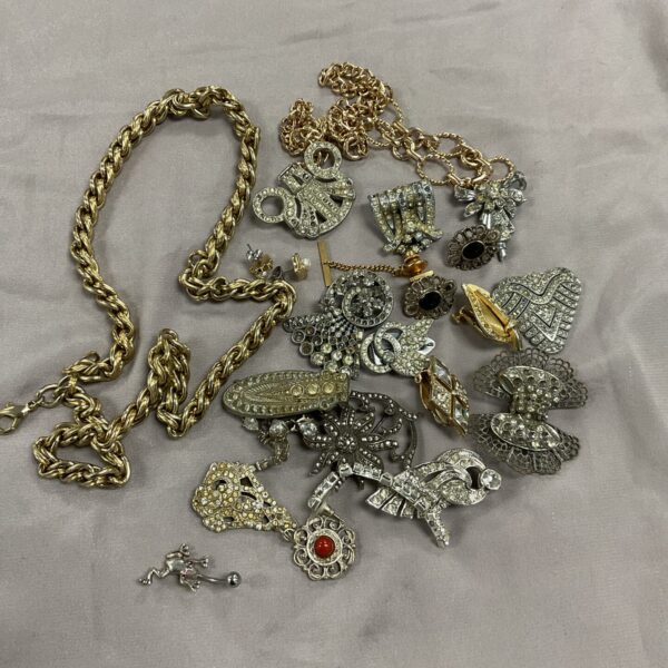 Vintage marcasite brooches and clips, Art Deco style jewellery collection.