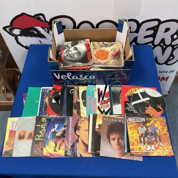 Vintage vinyl records 7 inch singles collection for music enthusiasts.