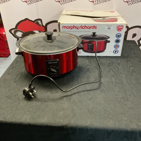 Red Morphy Richards sear and stew slow cooker kitchen appliance.