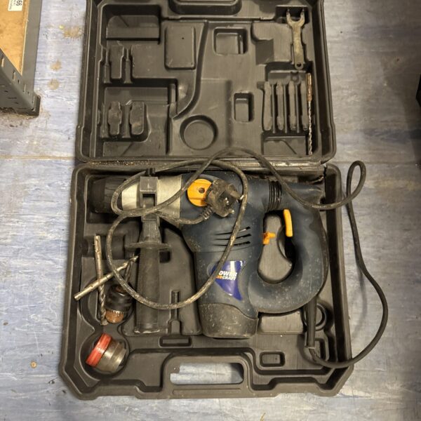 Powercraft hammer drill in open case with drill bits.