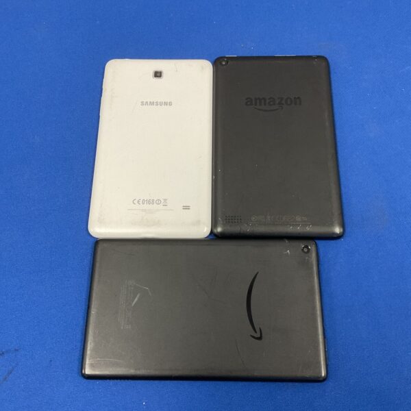 Samsung and Amazon tablets presented as a lot for collectors.