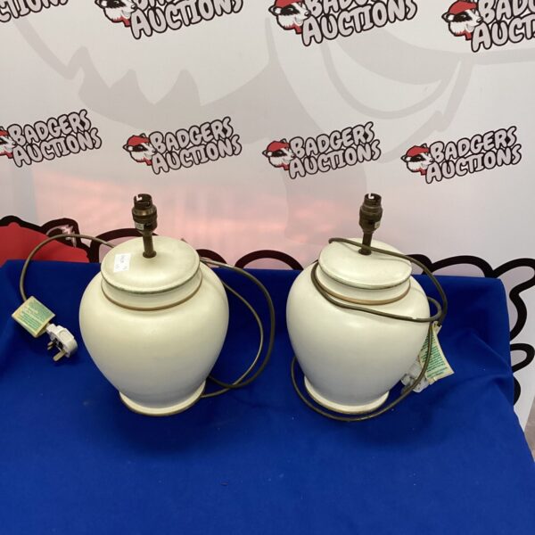 Pair of vintage pottery table lamps with creamy white glaze.