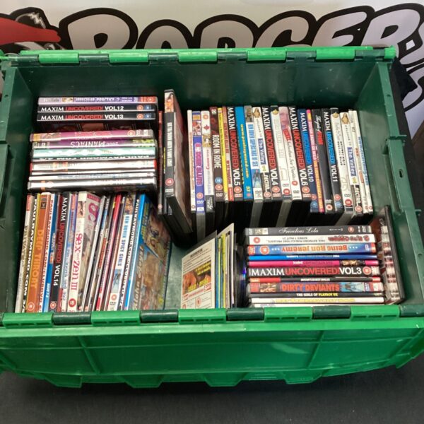 A green container filled with a large lot of adult DVDs.