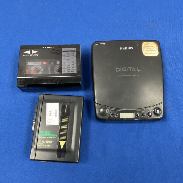 Vintage Sanyo walkman cassette player, retro portable audio device.
