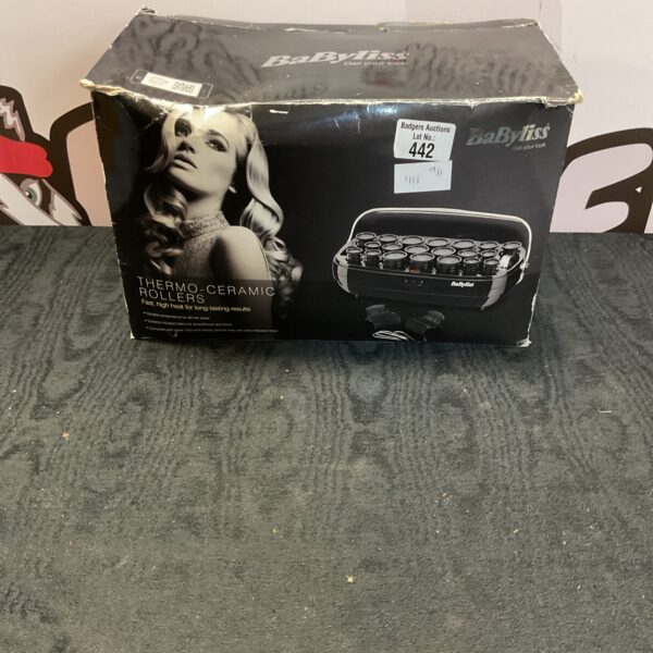 Babyliss thermo ceramic rollers set for creating curls and waves.