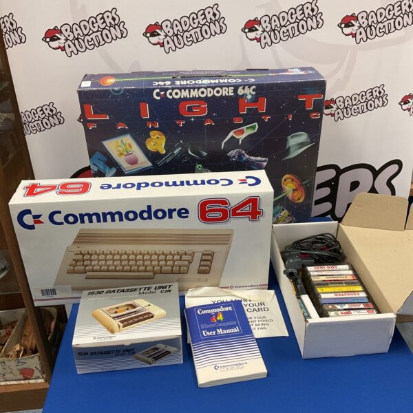 Boxed Commodore 64 Light Fantastic computer with games and accessories.