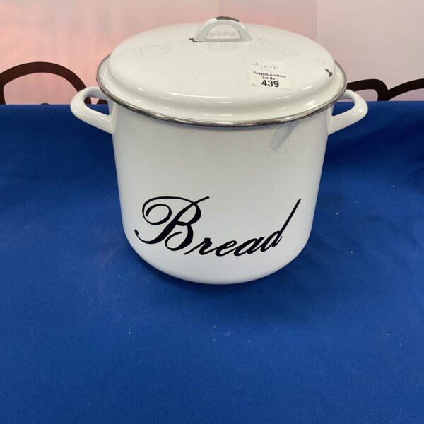 Vintage white bread tin for kitchen storage and display.