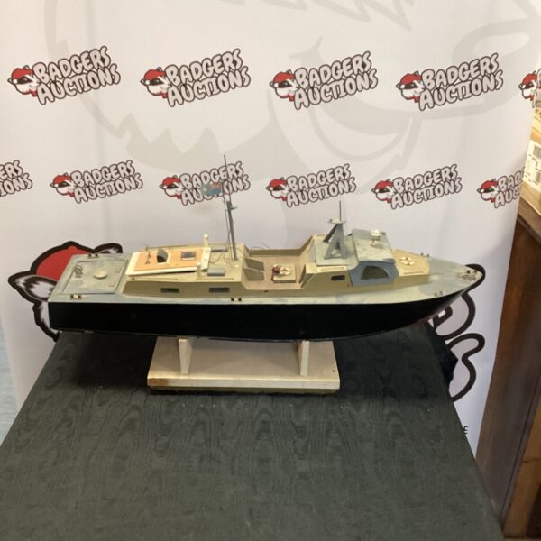 Detailed RC RAF rescue crash tender lifeboat model on stand.