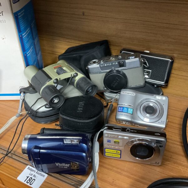 Vintage camera bundle featuring Olympus Pen and Sony Cybershot.