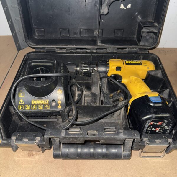 Vintage Dewalt DC711 cordless drill in original case.
