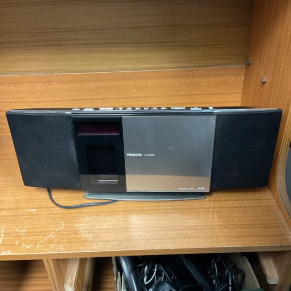 Panasonic SC-HC40DB vertical loading CD DAB radio system, front view.