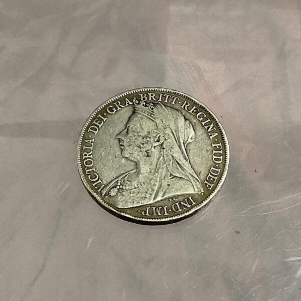 Obverse of a 1900 Victoria Old Head Silver Crown coin.