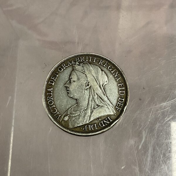 Obverse of a 1893 Victoria Old Head Silver Crown coin.