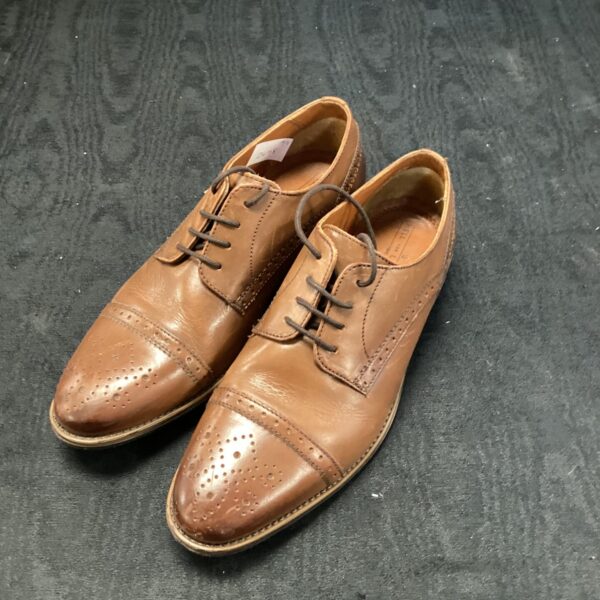 Classic size 7 brown leather shoes with brogue detailing.