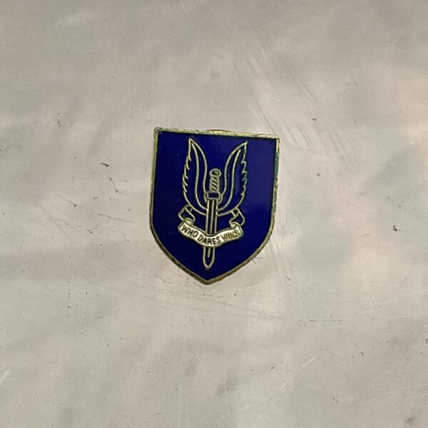 Detailed enamel SAS pin badge, British Army military collectible.
