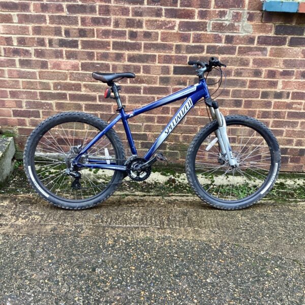Blue Specialized Hardrock mountain bike, used condition.