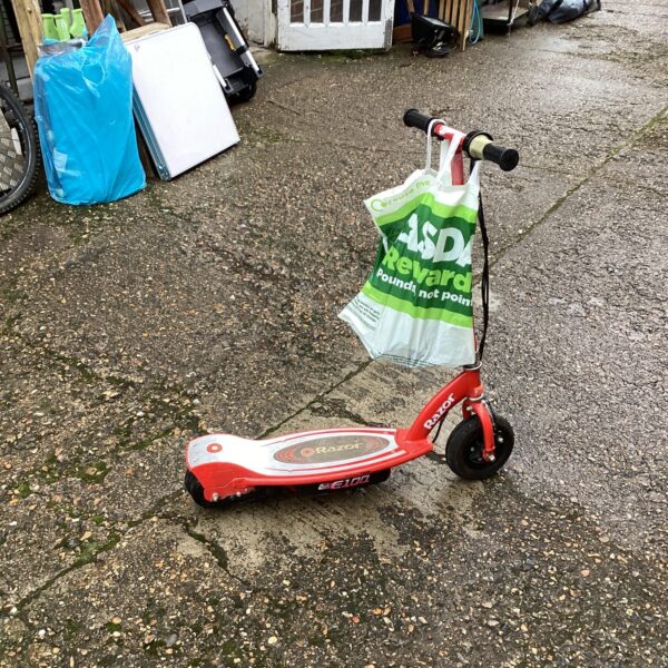 Razor E100 electric scooter for sale, foldable and rechargeable.