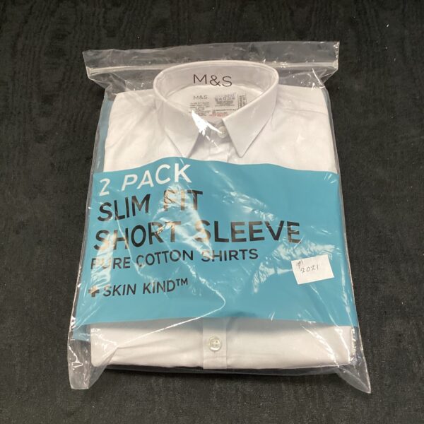 M&S two-pack of slim fit white short sleeve shirts.
