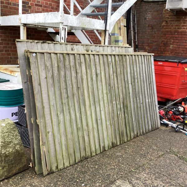 Weathered wooden garden fence panel, 8x5’6” for outdoor privacy.