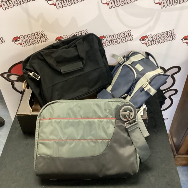 Lot of three laptop bags including a Goji branded bag.