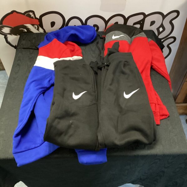 Blue Nike tracksuit set size M, athletic sportswear.