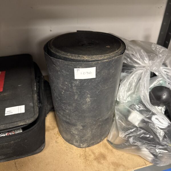 Part used galvanized steel roof flashing roll for repairs.
