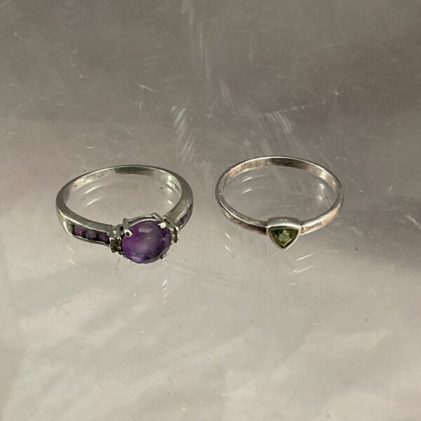 Two 925 Silver rings One set peridot and one set amethyst stones sizes O P