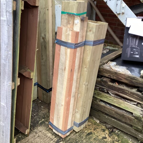 Three packs of softwood timber for DIY projects.