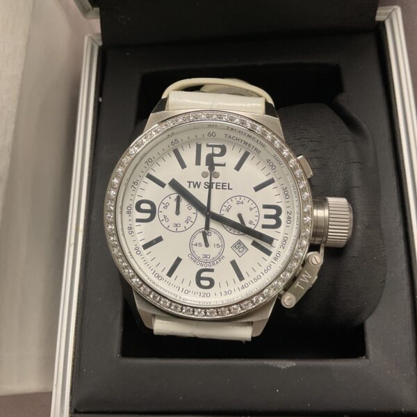 Stylish TW Steel quartz wristwatch with blue dial and crystal bezel.