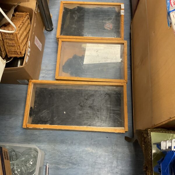Lot of three vintage wooden display cases for collectibles.