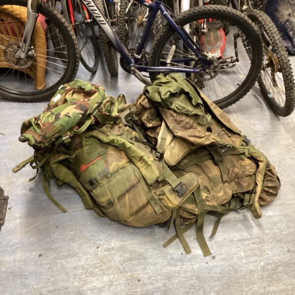 Lot of five army weighted backpacks for training and fitness.