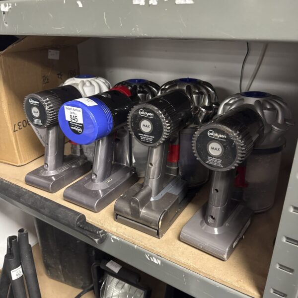 Lot of four Dyson handheld hoover bodies for repair.