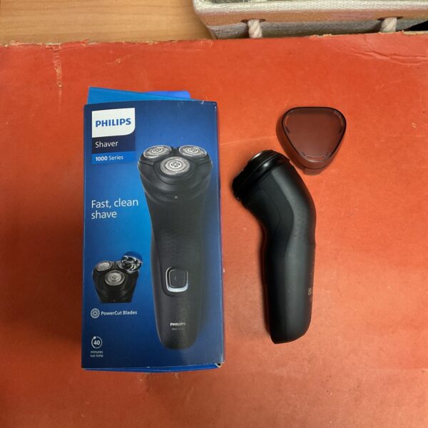 Philips 1000 Series electric shaver, cordless grooming appliance.