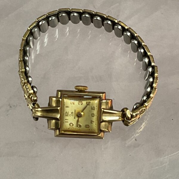 Vintage 9ct gold ladies watch with gold bracelet strap.
