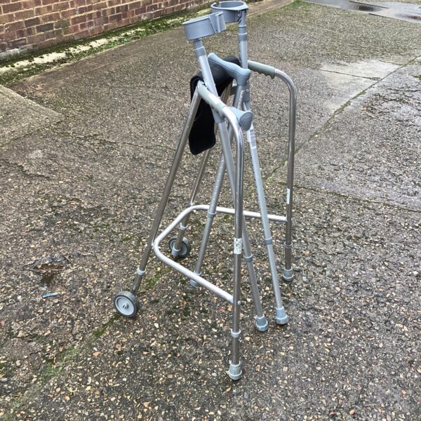 Used walking frame and crutches for mobility support.