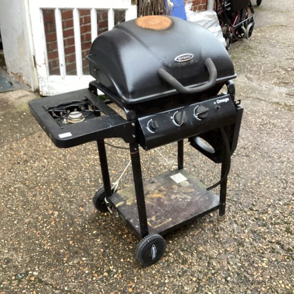 Black Outback gas BBQ with wheels and handle.