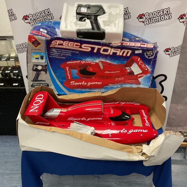 Vintage RC Speed Storm remote control car in original packaging.