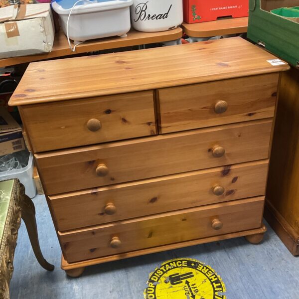 Vintage pine chest of drawers with three over two configuration.