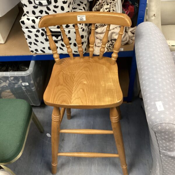 Vintage oak stool with circular seat and splayed legs.