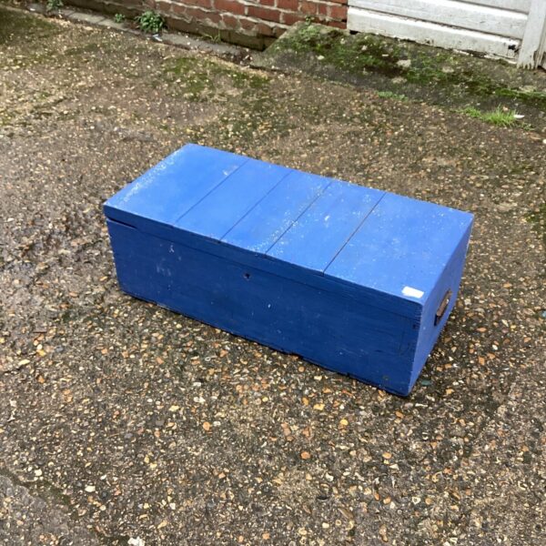 Vintage wooden storage chest with a blue painted finish.