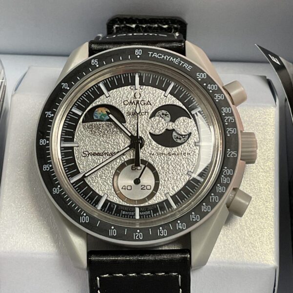 Front view of the Omega Swatch Moonwatch with lunar dial.