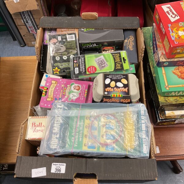 Assorted magic toys and tricks in a mixed lot.
