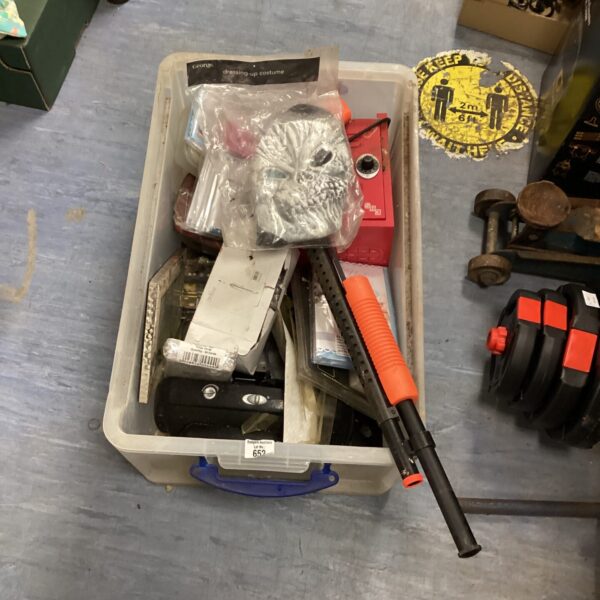 Mixed lot of household items in a plastic box.