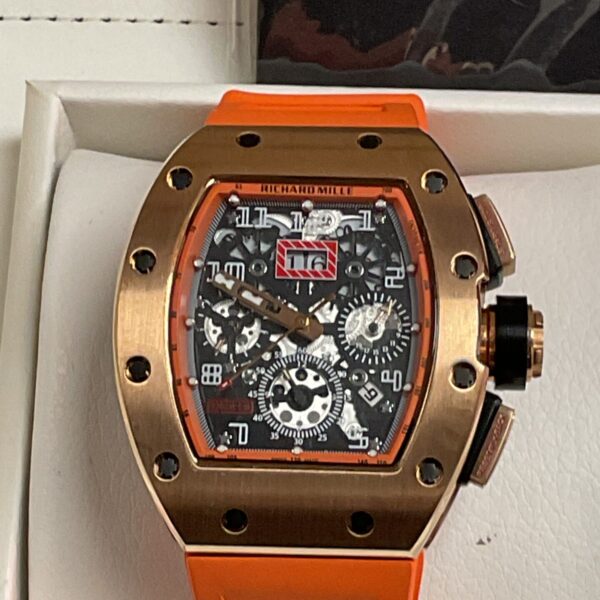 Front view of a Richard Mille style quartz wristwatch with orange strap.