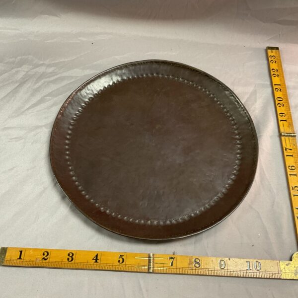 Antique John Pearson copper plate with textured surface.