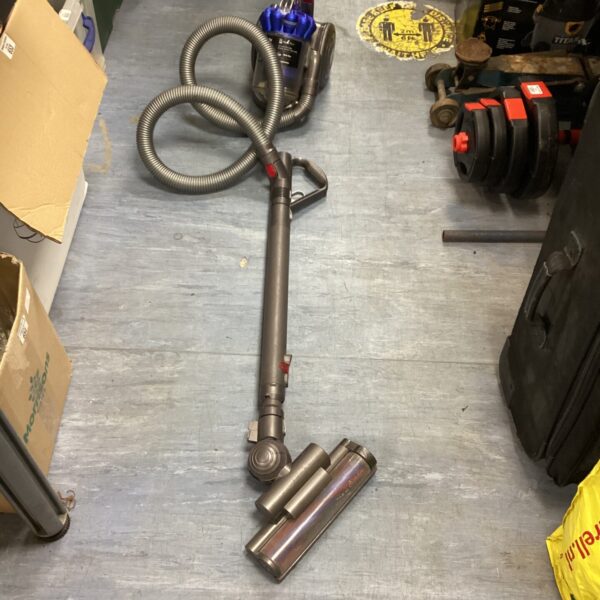 Front view of a used Dyson City vacuum cleaner.