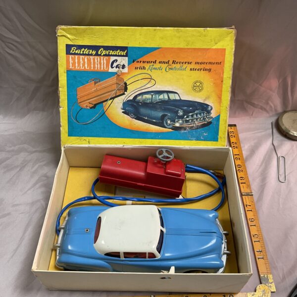 Vintage Marx electric car in original box, collectible toy.