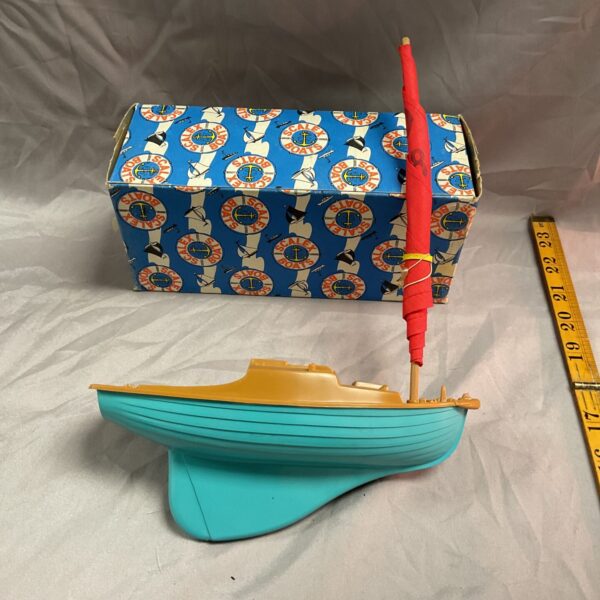 Vintage Scalex Jolly Boat in original box, collectible toy boat.
