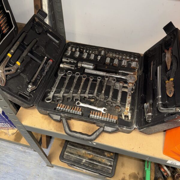 Vintage tool kit in a carry case with various hand tools.